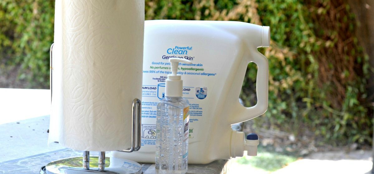 handwashing station with an old laundry liquid bottle