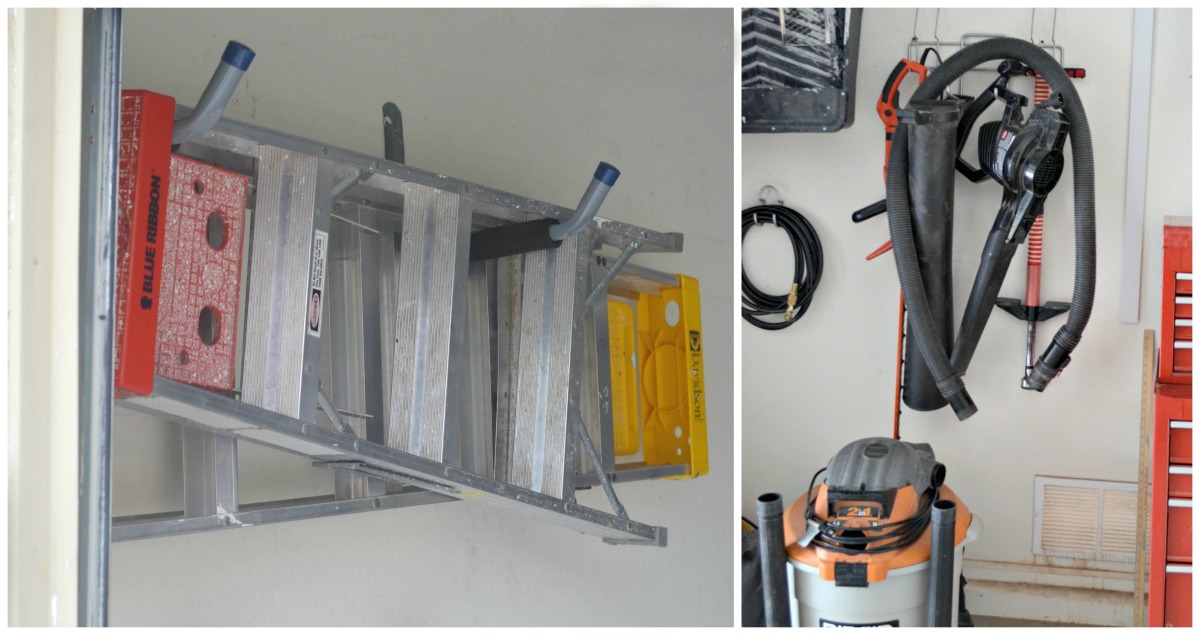 tools hanging from a garage wall alongside a shop vac
