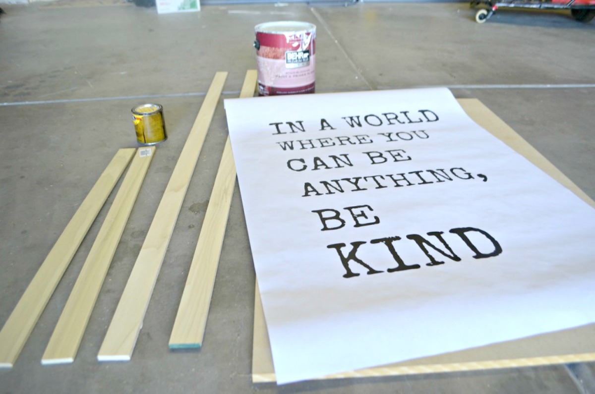 paper that reads "in a world where you can be anything, be kind"