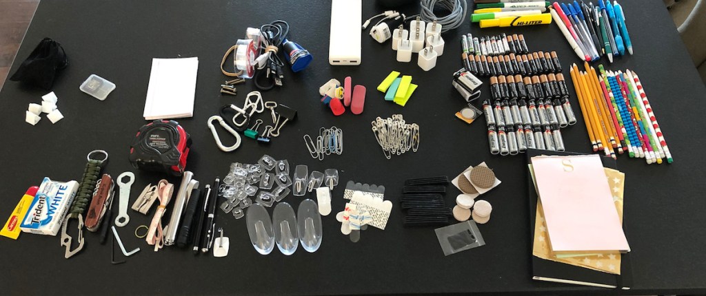 organized piles of odd and end miscellaneous things in groups