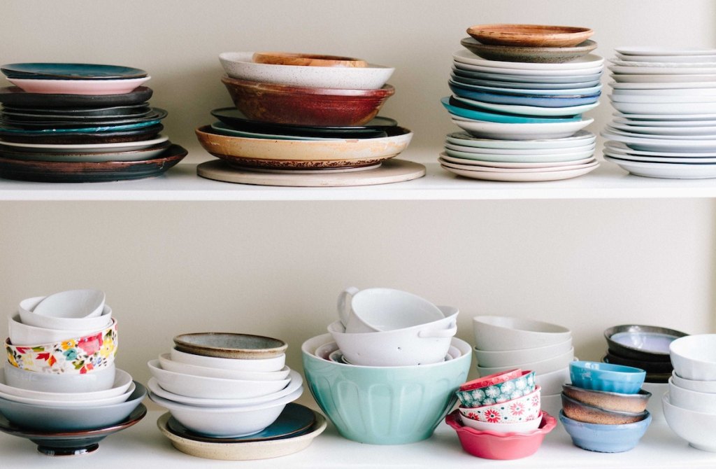 various colors and shapes of dishes plates and bowls