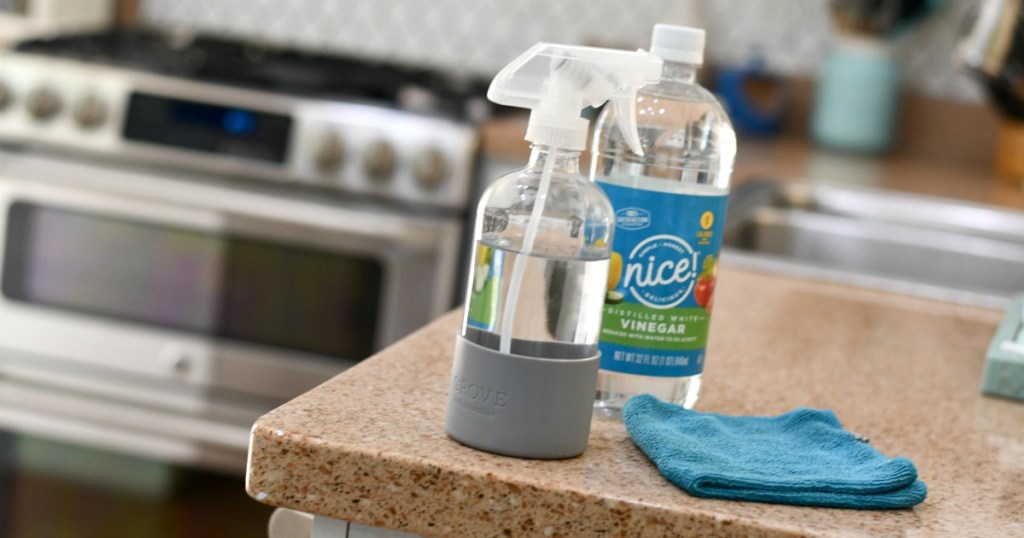 glass bottle from grove with vinegar cleaning solution