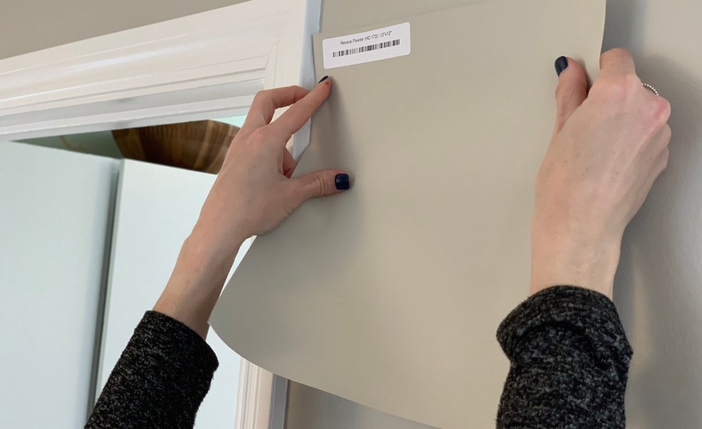 beige colored square paint sample on a matching wall