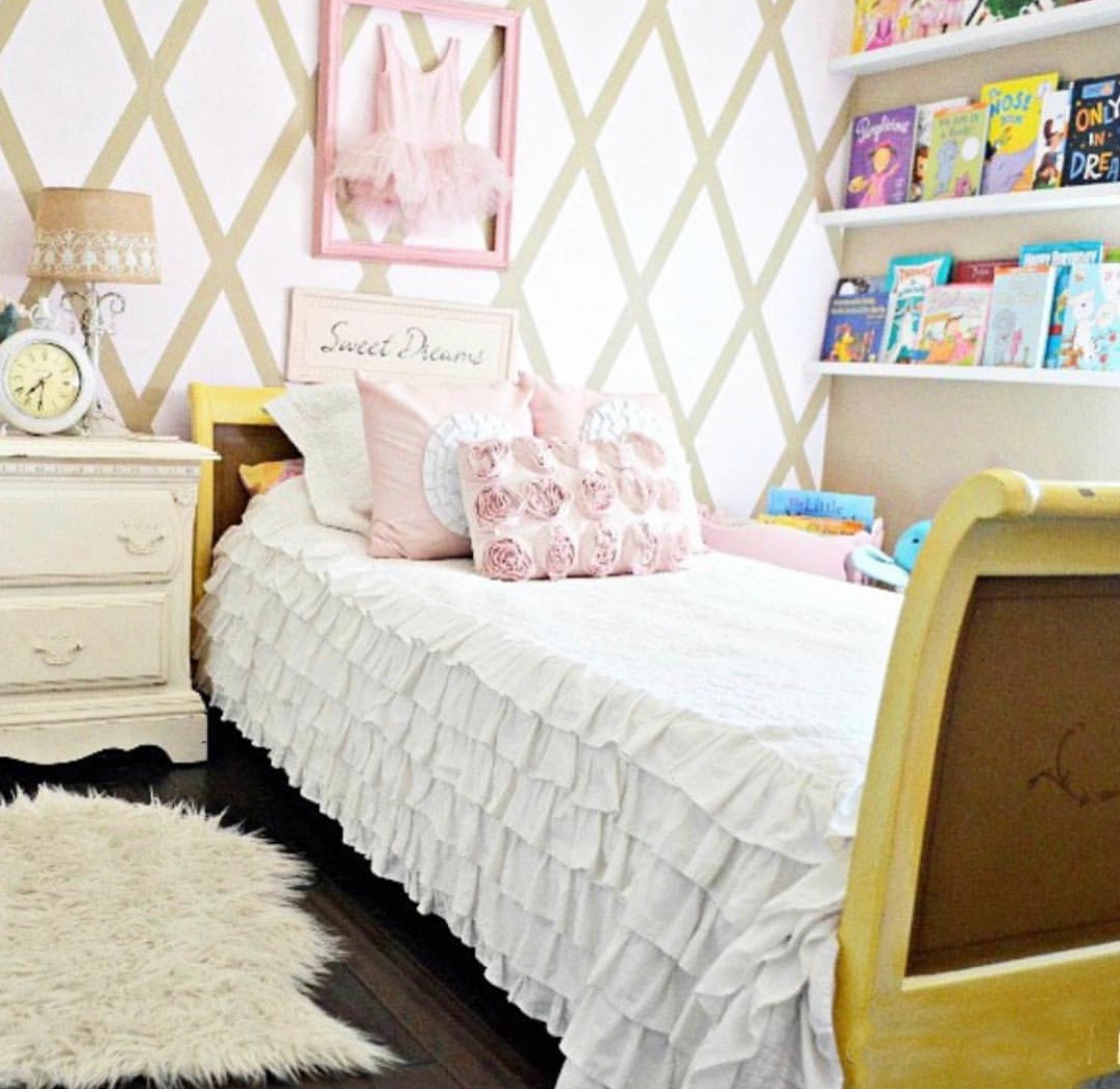 pink and white girls room with ruffle bedding 
