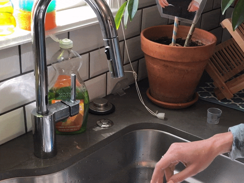What happens when colling reached for sponge with motion sense faucet