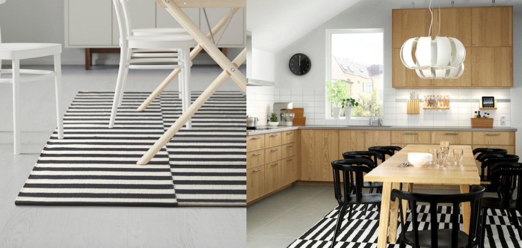 black and white stripe rug under modern wood table and chairs in kitchen