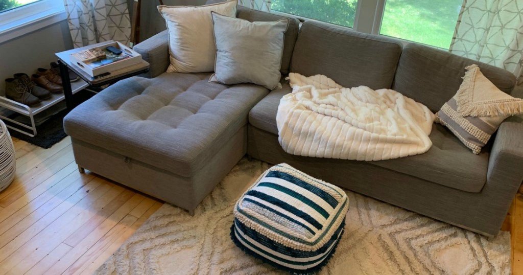 living room with grey sectional couch 