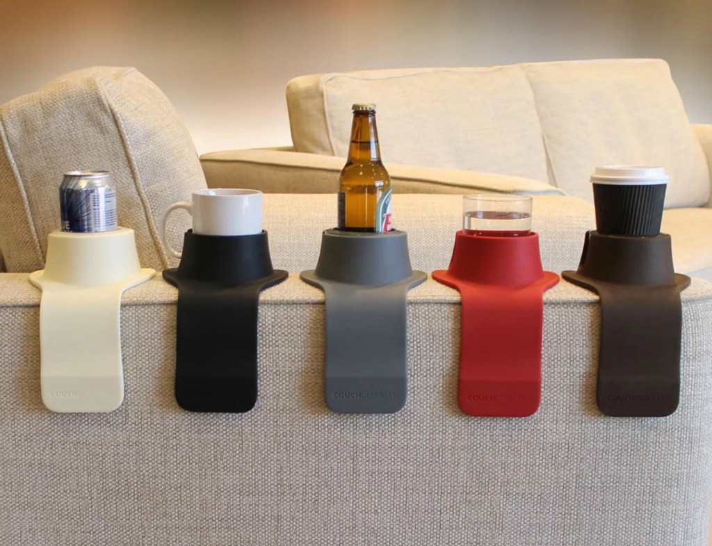 Couch Coasters on couch holding drinks