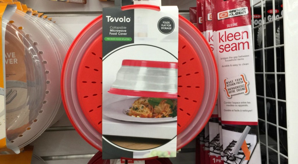 red collapsible food cover hanging on store shelf