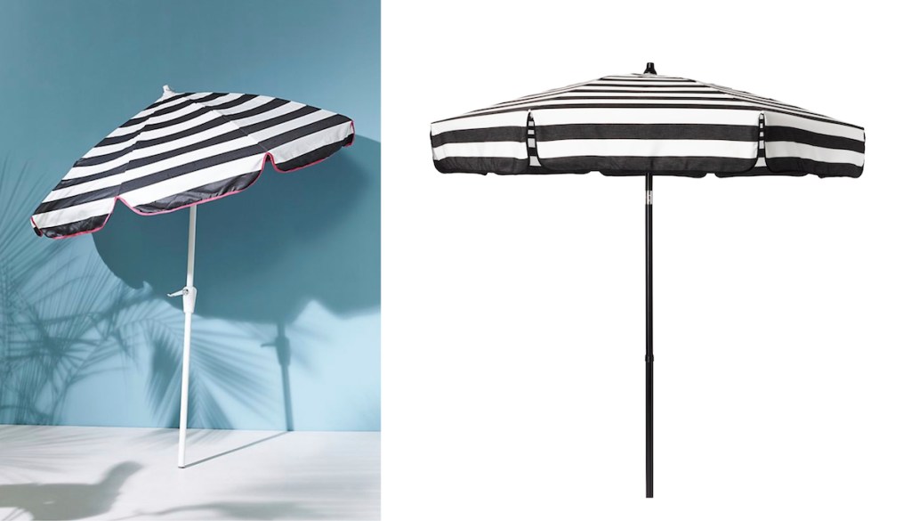 black and white stripe umbrella with blue wall next to stock photo