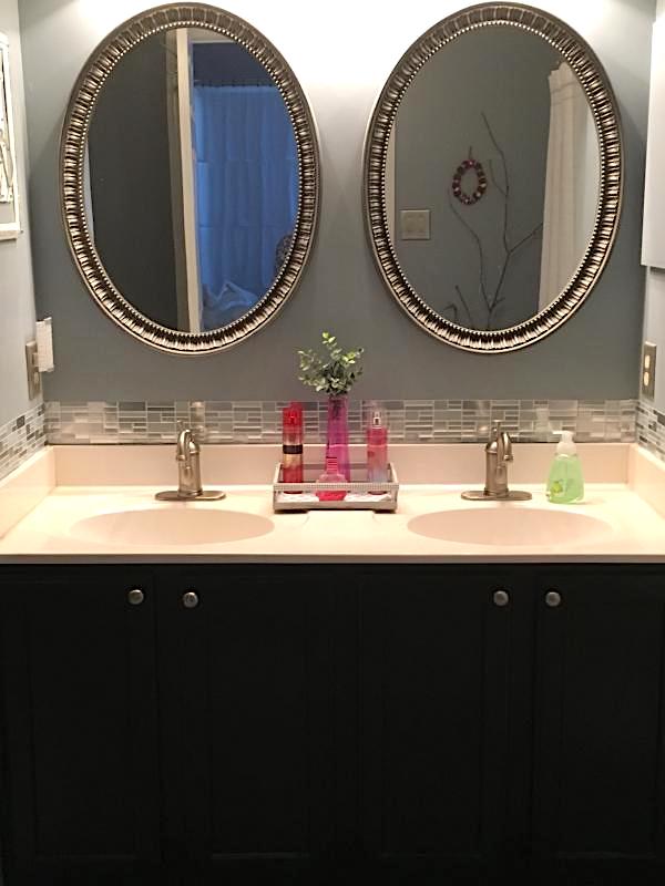 bathroom with Dollar Tree peel and stick tiles 