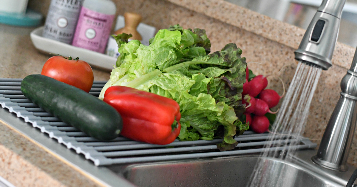 sink dish drying drying mat with produce on top 