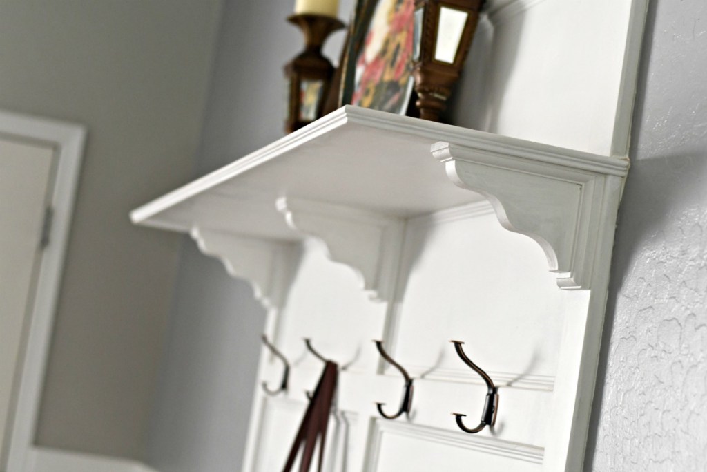 top shelf with wood corbels as part of the DIY hall tree project 