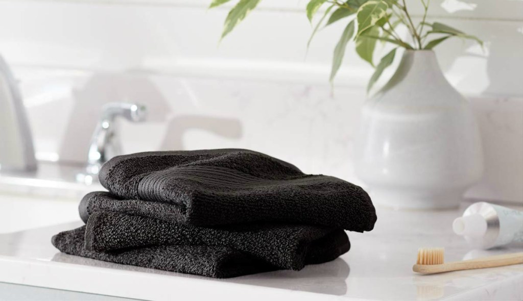 stack of black washcloths