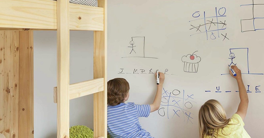 kids writing on dry erase board wall 