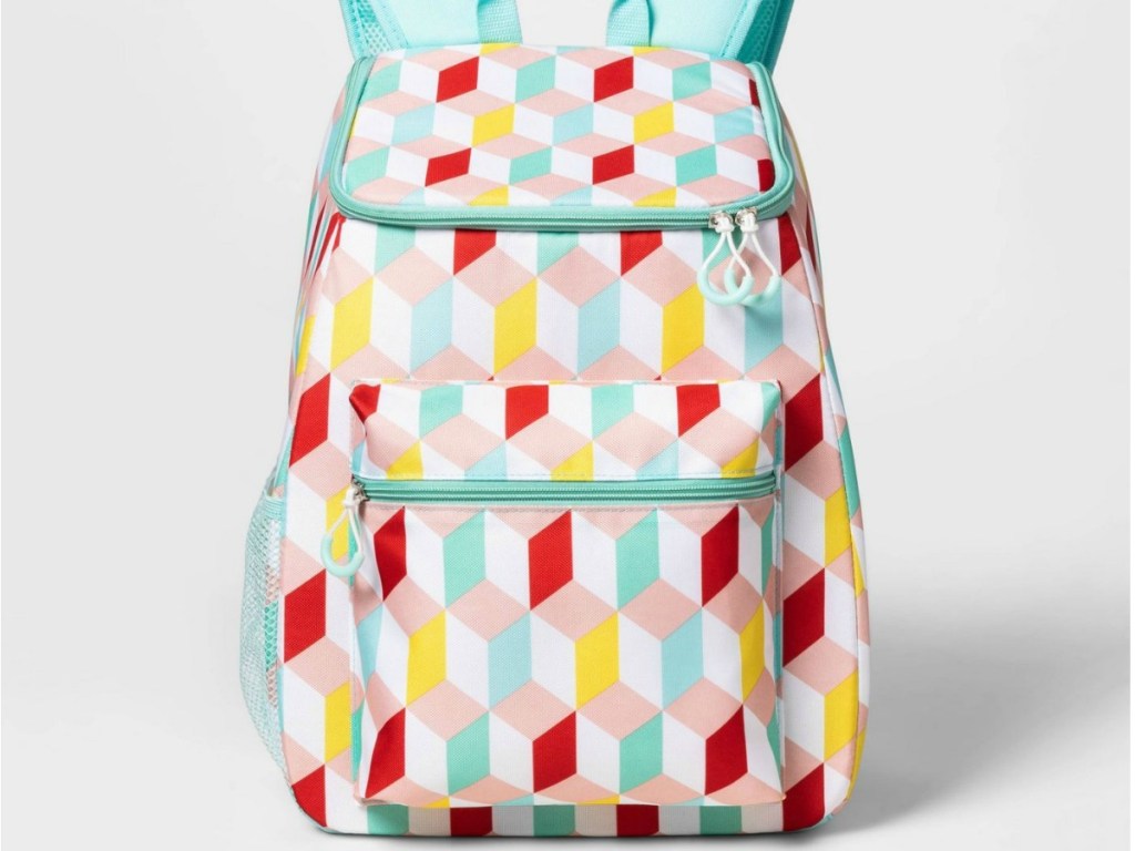 geo print backpack with teal, red, and yellow colors