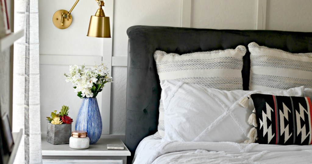 Lina's Bedroom side table and gold sconce 