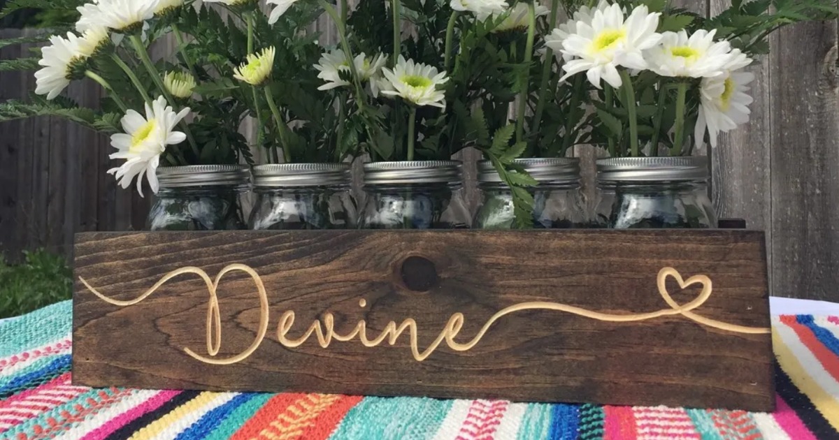 mason jar wood centerpiece with flowers 