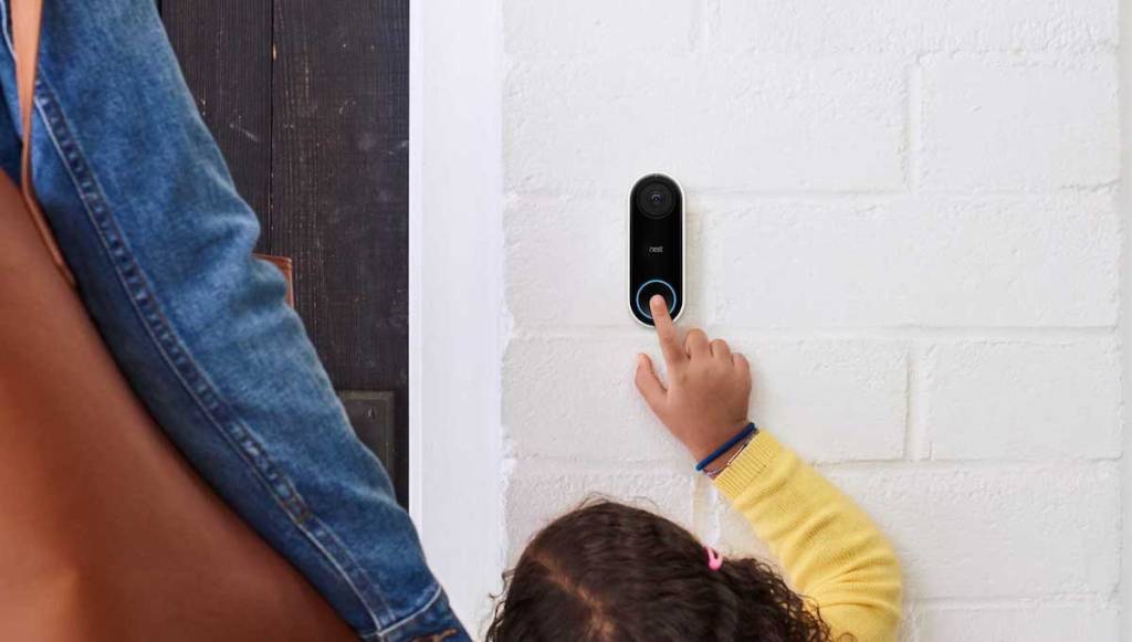 girl pressing nest doorbell 