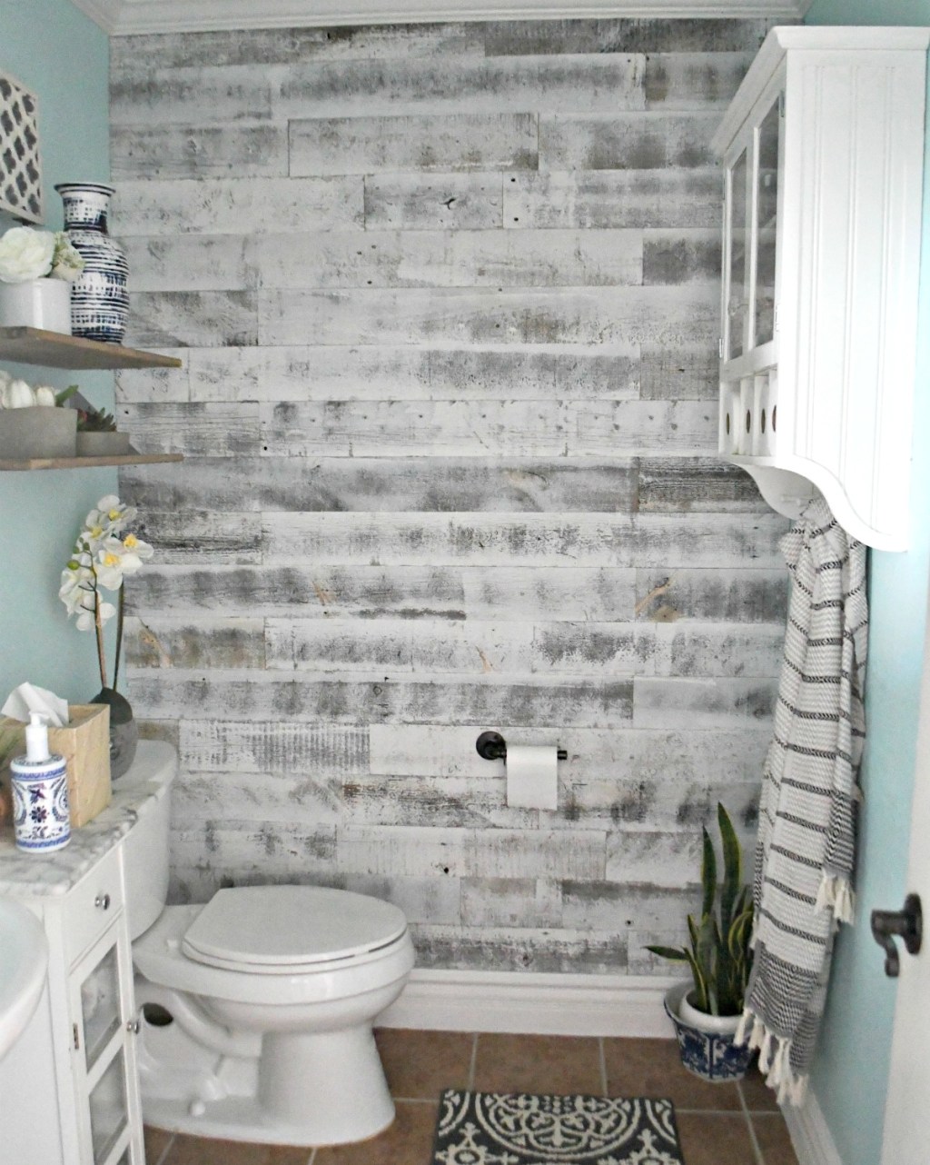 bathroom after installing stikwood planked wall