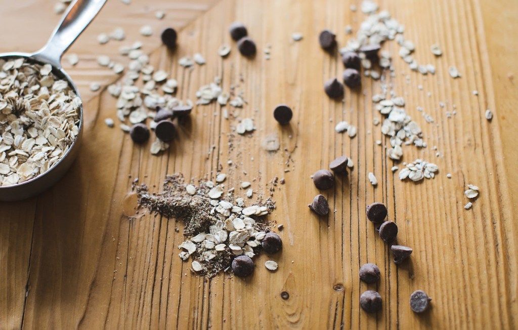 oats and chocolate chips spilled on counter