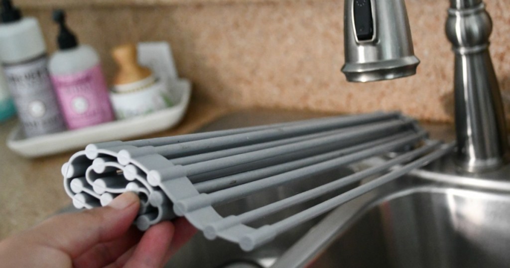 holding foldable drying rack in kitchen 