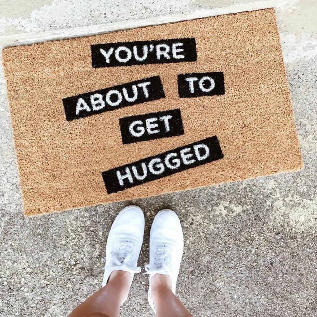 person standing in front of you're about to get hugged mat