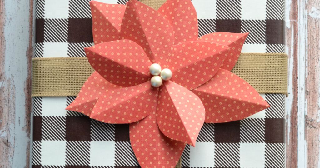 DIY paper poinsettia gift topper