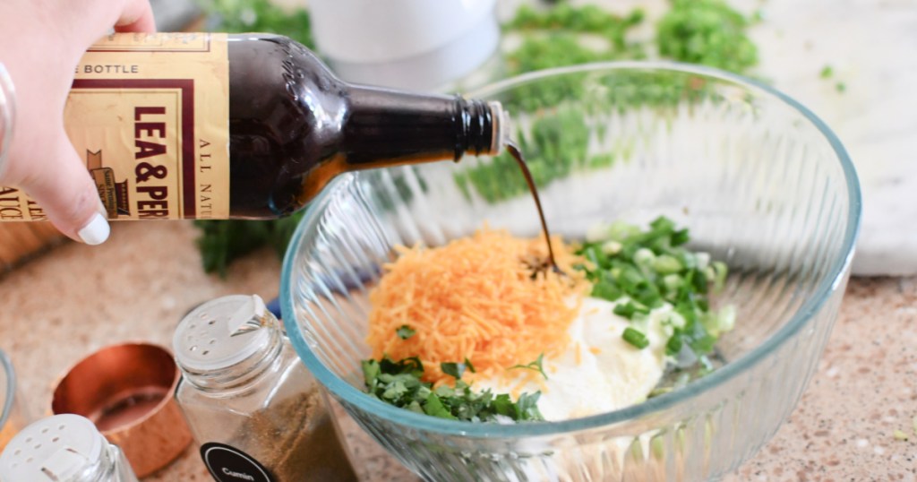 adding Worcestershire sauce to cheese ball