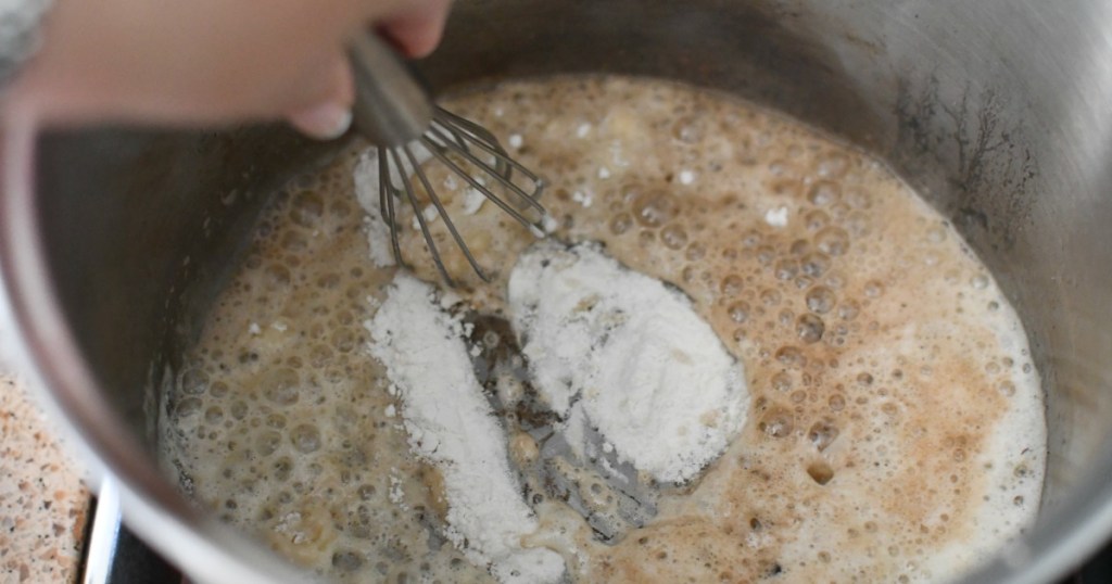 whisking flour and butter together in a pot