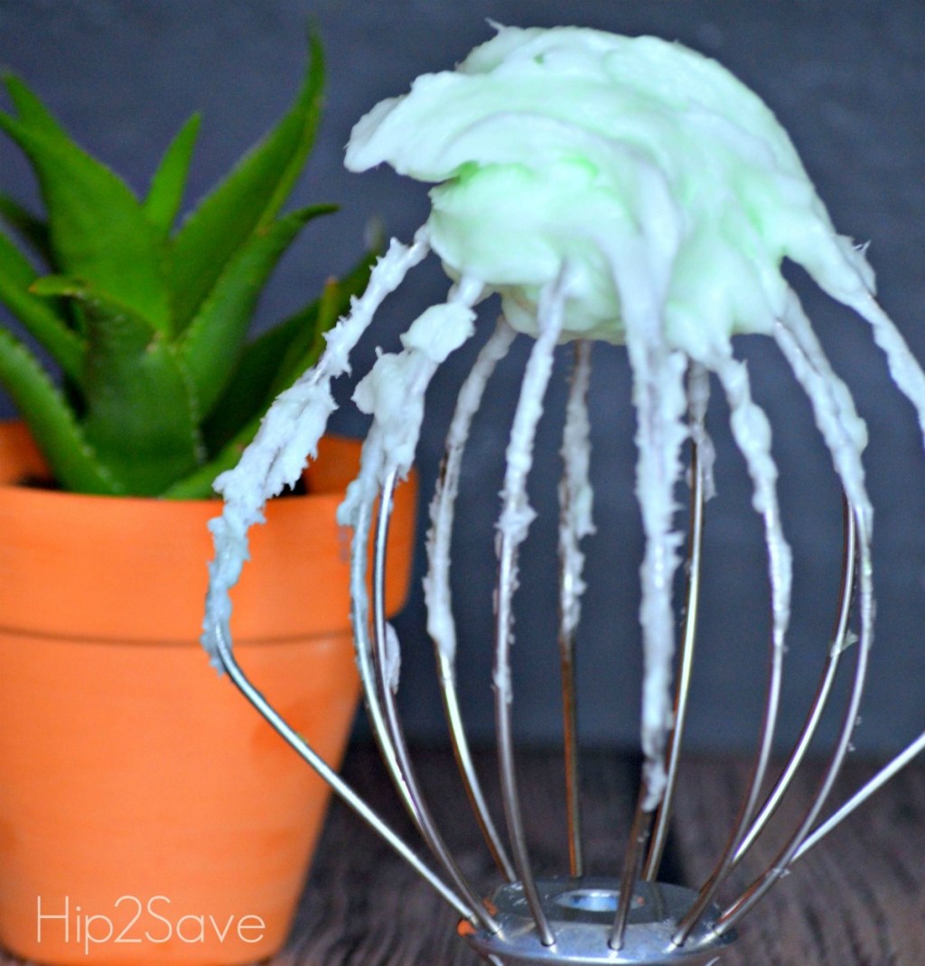whipped coconut oil on a mixing bowl whisk 