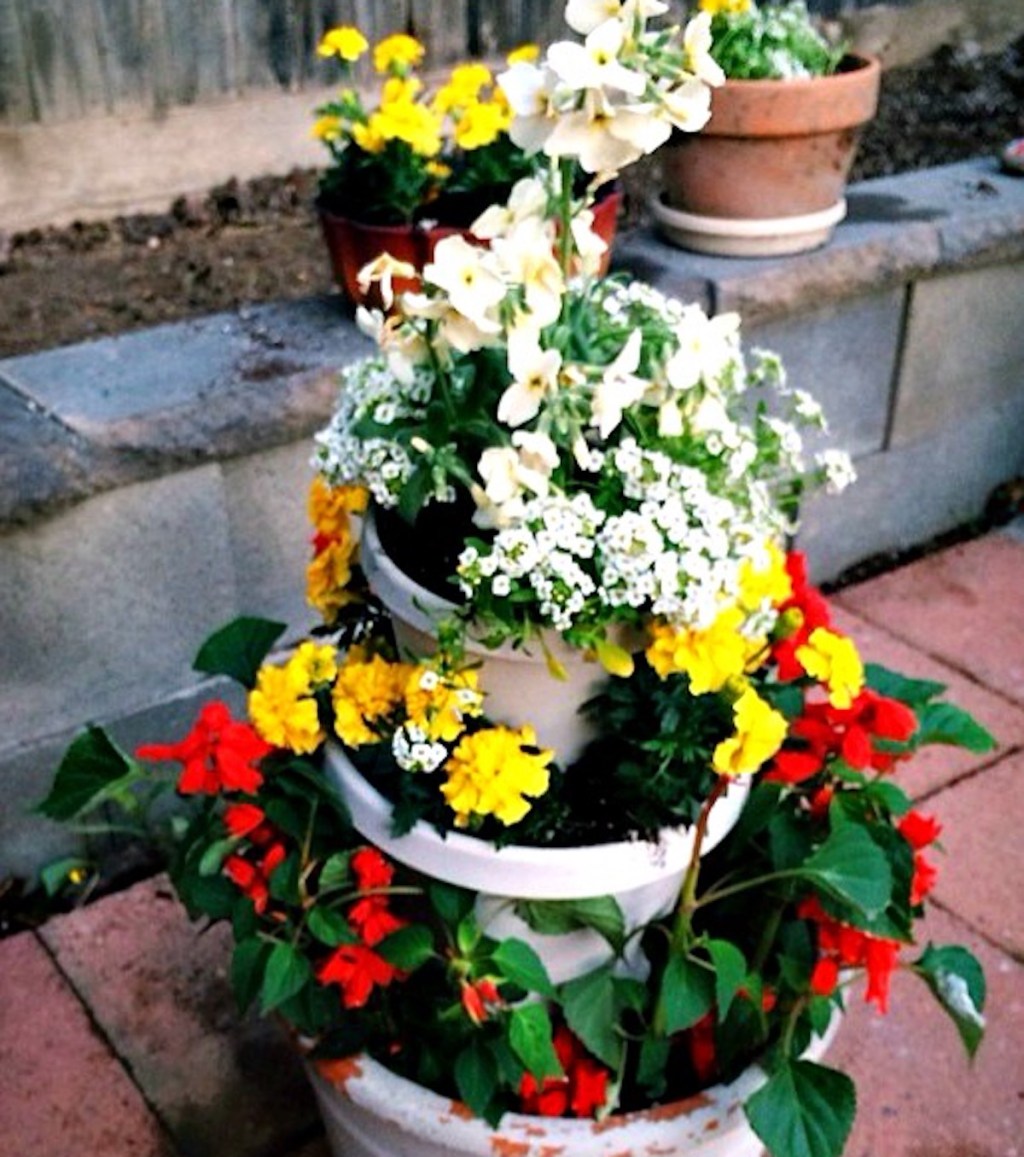 vibrant flowers in tiered planter