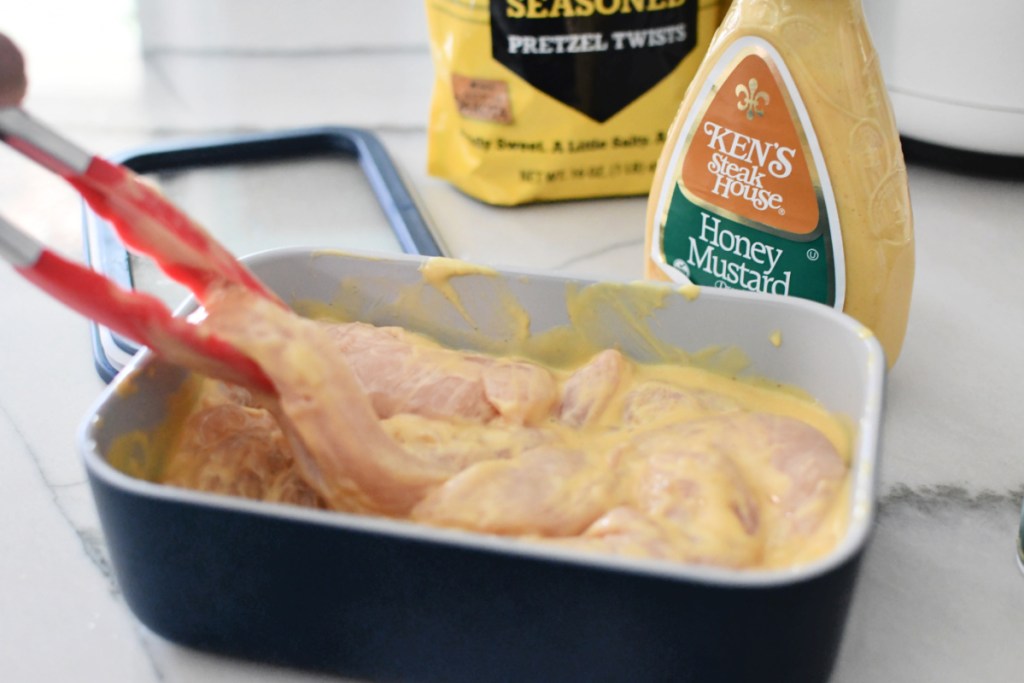 marinating chicken tenders in honey mustard salad dressing