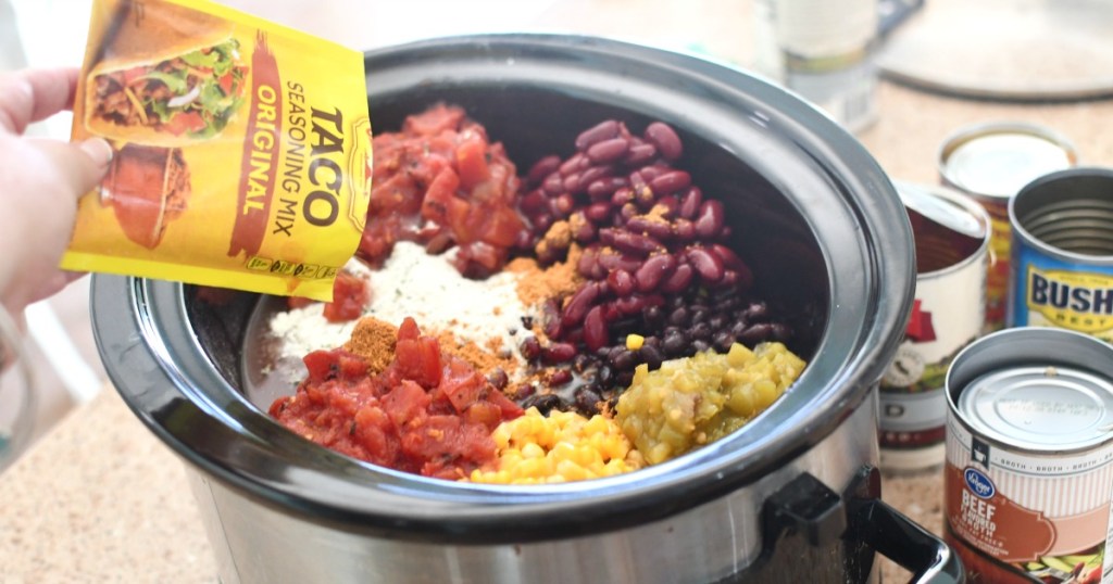 adding taco seasoning to slow cooker taco soup