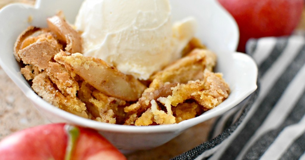 bowl with apple dump cake and ice cream