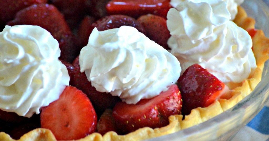 fresh strawberry pie with whipped cream
