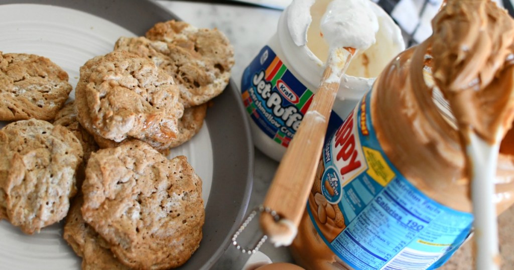 fluffernutter cookies on plate with skippy peanut butter and jet-puffed marshallow creme on counter