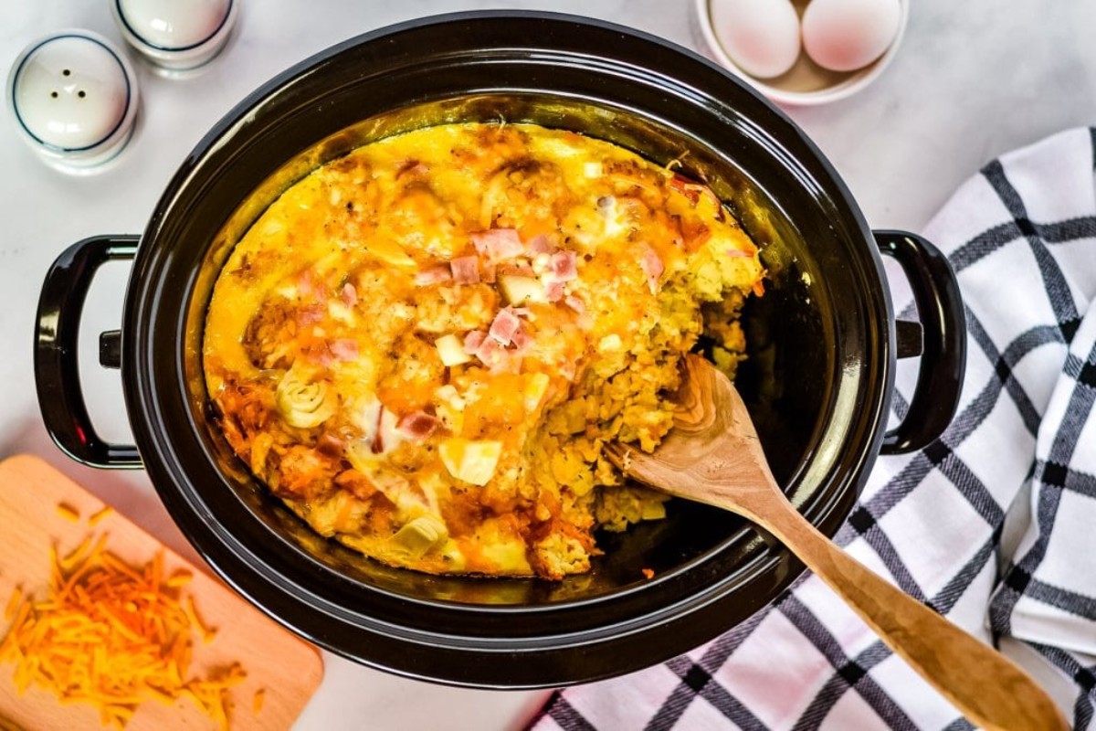 Crockpot filled with tater tot egg bake casserole