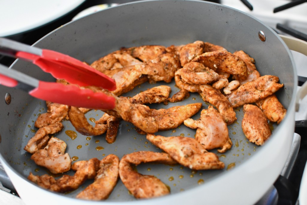 cooking chicken in a skillet