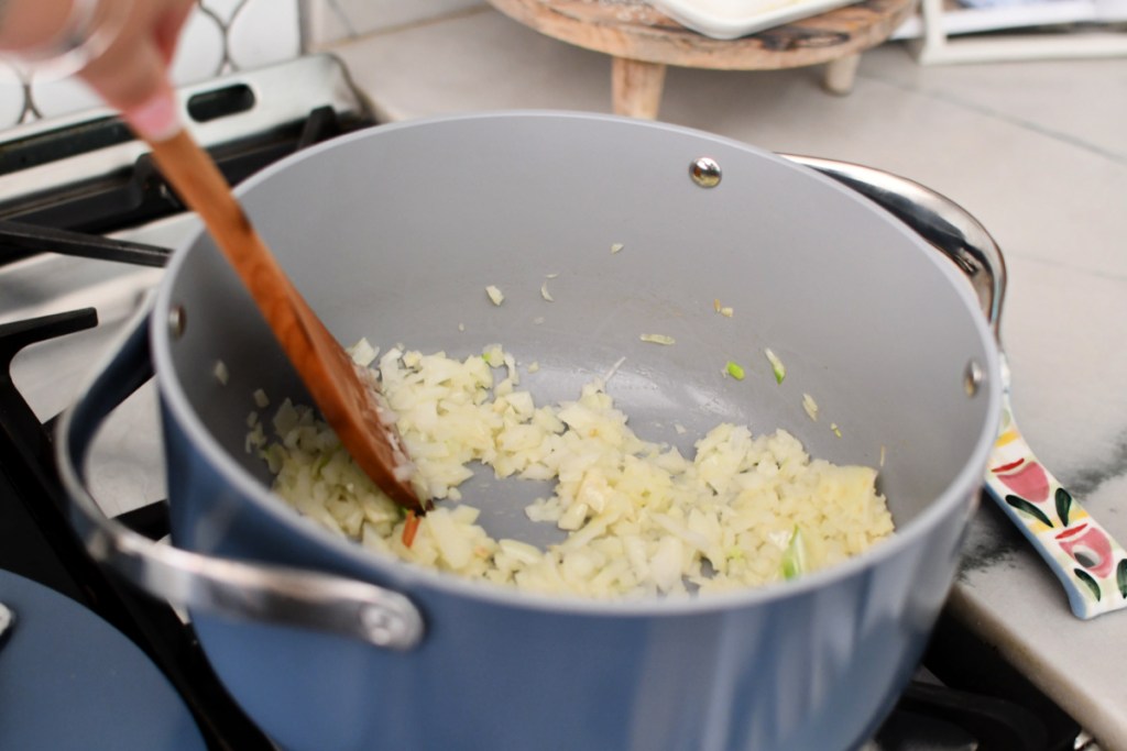 cooking onions in a pot