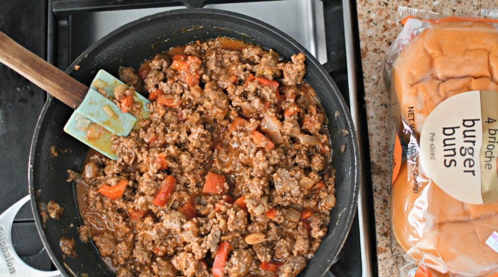 skillet with sloppy joes and buns