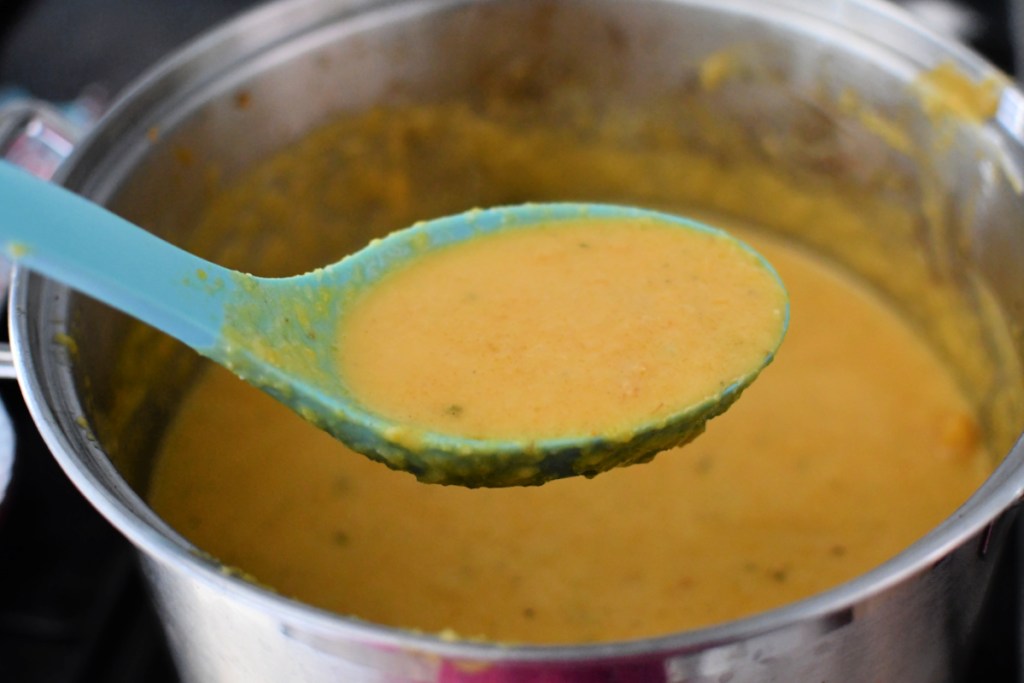 butternut squash soup on a spoon