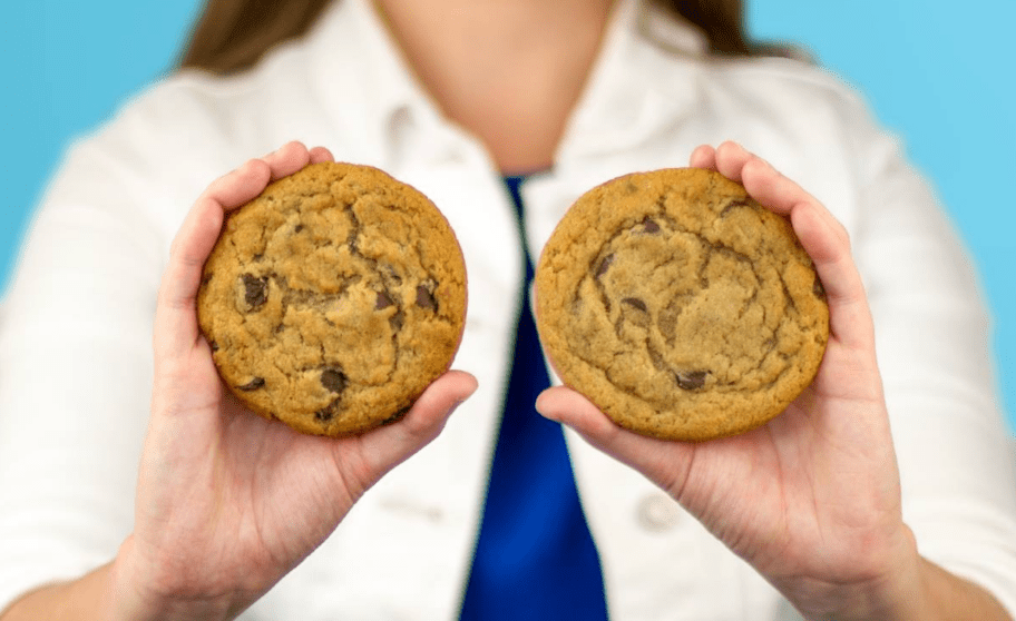 holding Great American cookies 