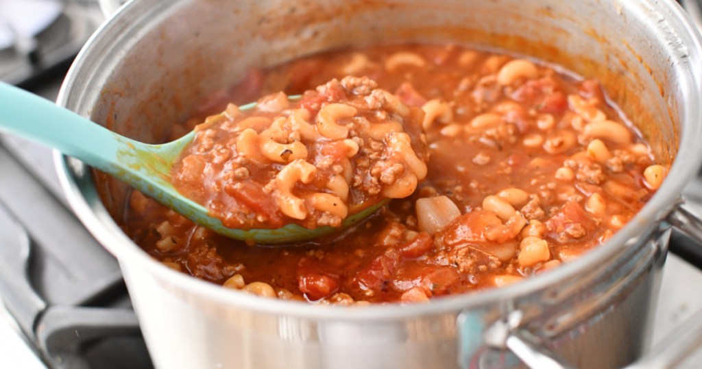 stirring bowl of goulash