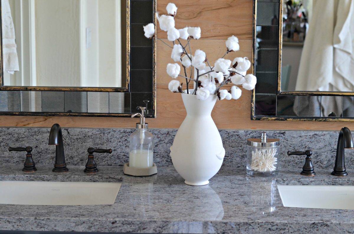 Home Decor DIY cotton stem branches in a vase on a bathroom vanity counter