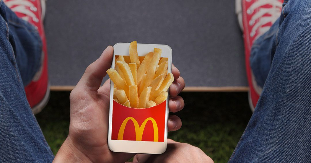 McDonald's app - with french fries popping out of the phone