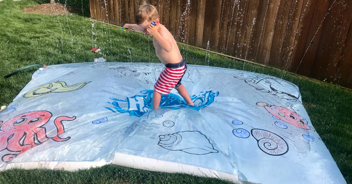 kid walking on fun water blob mat