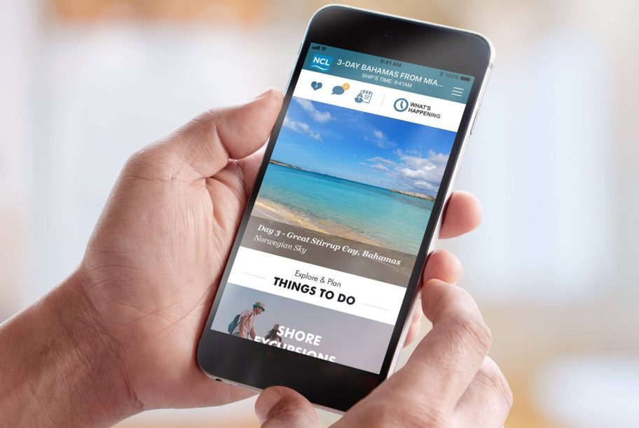 person using a cruise ship app, something to download when you plan a cruise