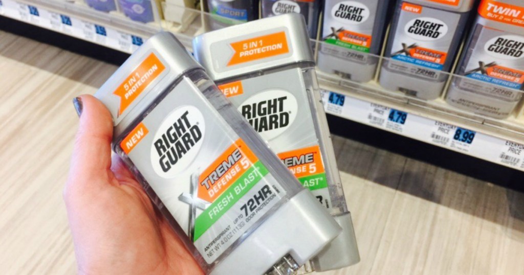 Hand holding Right Guard Xtreme Deodorant at Rite Aid 