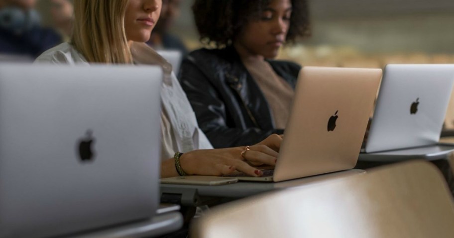 students.on apple laptop who may have gotten into college using weird scholarships